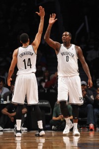 Andray-Blatche-high-fives-Shaun-Livingston