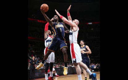 Washington continua a correre verso i playoffs: Wall sale in cattedra, Pacers battuti per 91-79